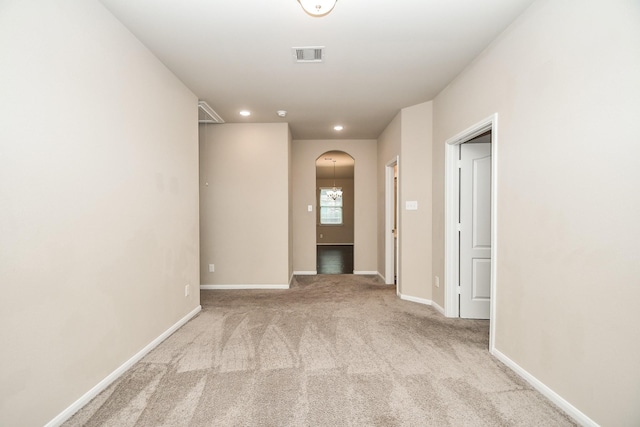 7718 Collina Landing Trl, Richmond, TX 77407 - hallway with arched walkways, carpet floors, baseboards, and recessed lighting