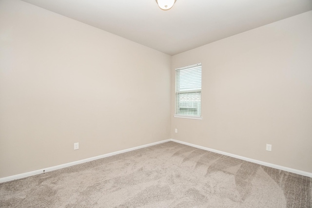 7718 Collina Landing Trl, Richmond, TX 77407 - carpeted spare room with baseboards and lofted ceiling