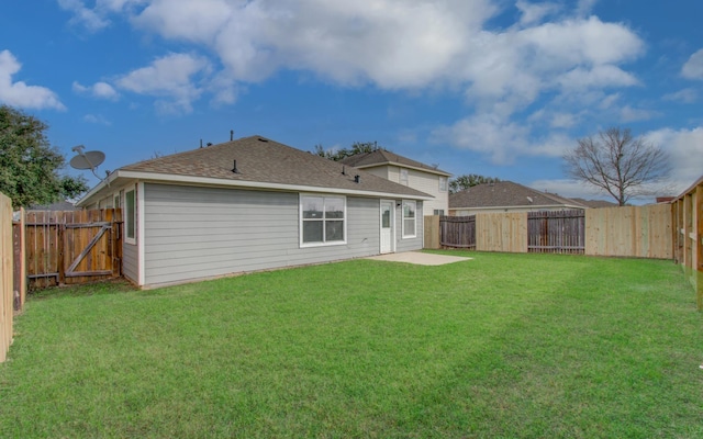 19835 Byron Meadows Dr, Katy, TX 77449 - back of property with roof with shingles and a patio area