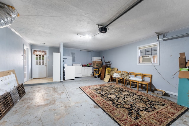 1001 Windy Dr, Brenham, TX 77833 - garage with washer and dryer, cooling unit, a garage door opener, refrigerator, and electric panel