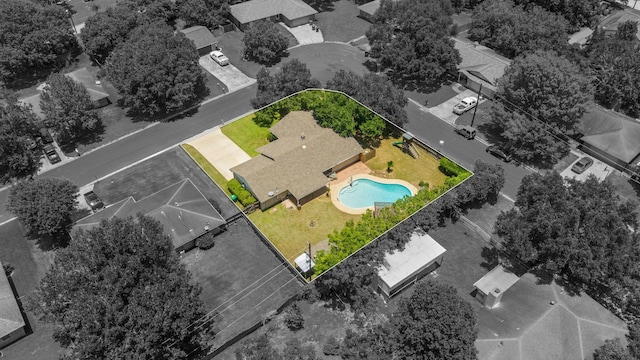 aerial overview of property's location featuring a pool area and property parcel outlined