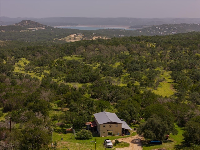 1651 Jdj Dr, New Braunfels, TX 78132 - aerial view of property and surrounding area with a forest and a mountainous background