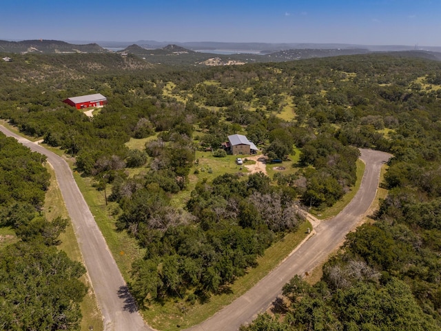 1651 Jdj Dr, New Braunfels, TX 78132 - aerial view of property and surrounding area featuring a forest