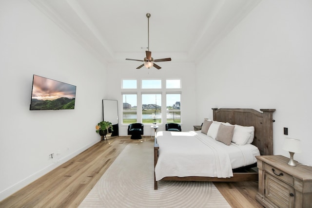 4914 Olive Province Ln, Manvel, TX 77578 - bedroom with light wood-style flooring and ceiling fan