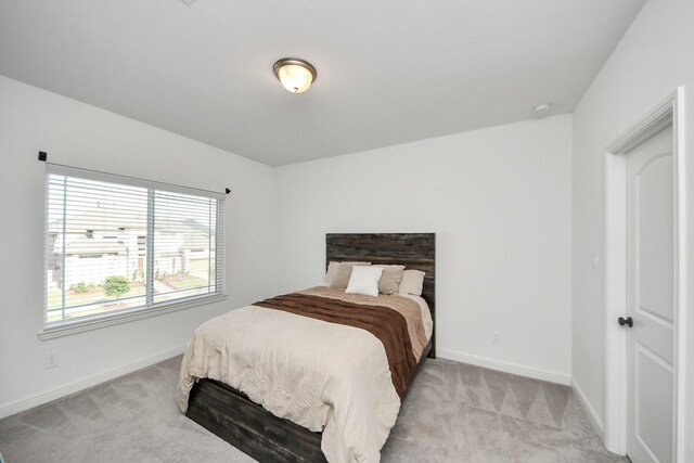 4914 Olive Province Ln, Manvel, TX 77578 - bedroom with light carpet and baseboards