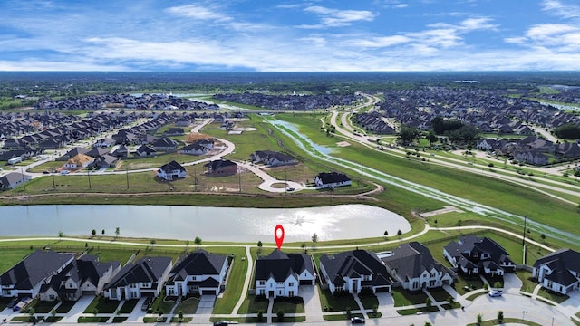 4914 Olive Province Ln, Manvel, TX 77578 - aerial view of property's location featuring a large body of water and nearby suburban area