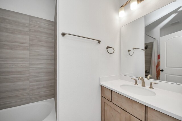 4914 Olive Province Ln, Manvel, TX 77578 - bathroom featuring vanity and shower / bath combo with shower curtain