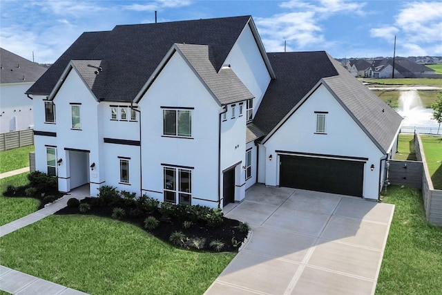 4914 Olive Province Ln, Manvel, TX 77578 - french provincial home with stucco siding, driveway, and a shingled roof