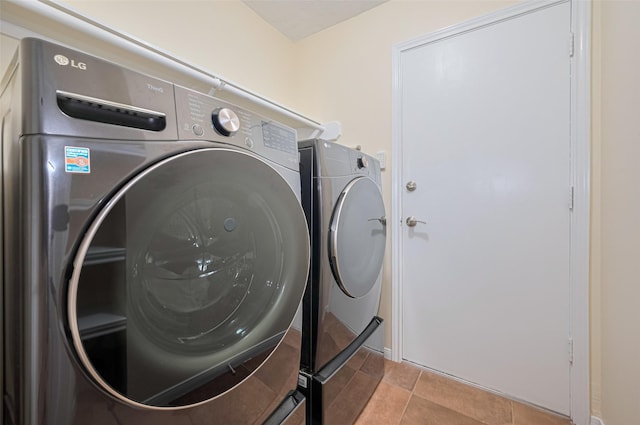 4126 Rocky Bend Dr, Sugar Land, TX 77479 - clothes washing area featuring washing machine and dryer