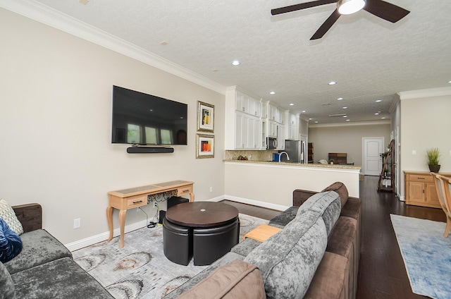 1913 Rosewood St, Houston, TX 77004 - living area with recessed lighting, dark wood-type flooring, ceiling fan, baseboards, and ornamental molding