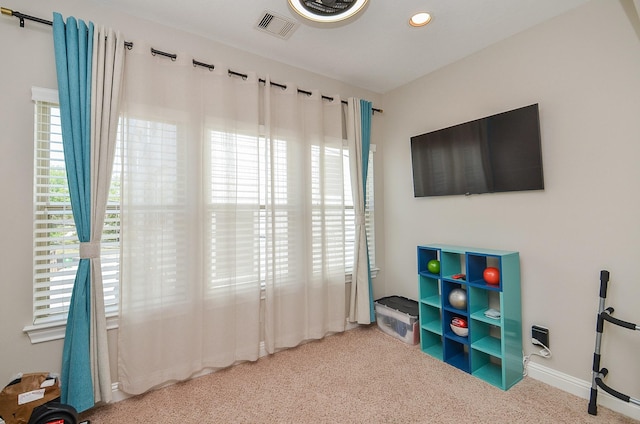 1913 Rosewood St, Houston, TX 77004 - recreation room with carpet flooring, recessed lighting, and baseboards