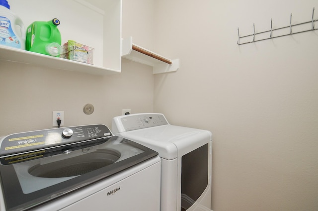 1913 Rosewood St, Houston, TX 77004 - washroom featuring separate washer and dryer