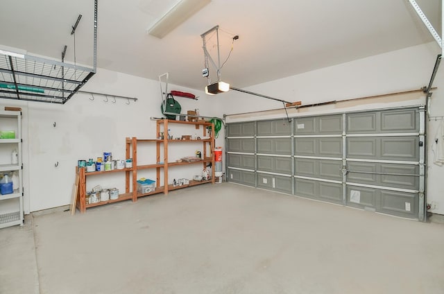 1913 Rosewood St, Houston, TX 77004 - garage featuring a garage door opener