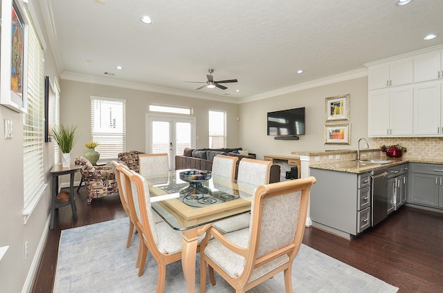 1913 Rosewood St, Houston, TX 77004 - dining space with dark wood-style flooring, ceiling fan, recessed lighting, and crown molding
