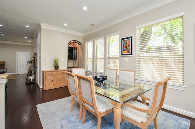 1913 Rosewood St, Houston, TX 77004 - dining space with recessed lighting, ornamental molding, dark wood-type flooring, and baseboards