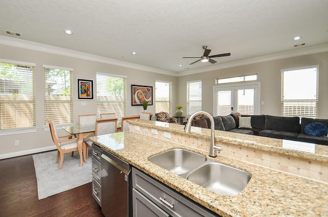 1913 Rosewood St, Houston, TX 77004 - kitchen featuring a sink, stainless steel dishwasher, dark wood-style flooring, open floor plan, and a ceiling fan