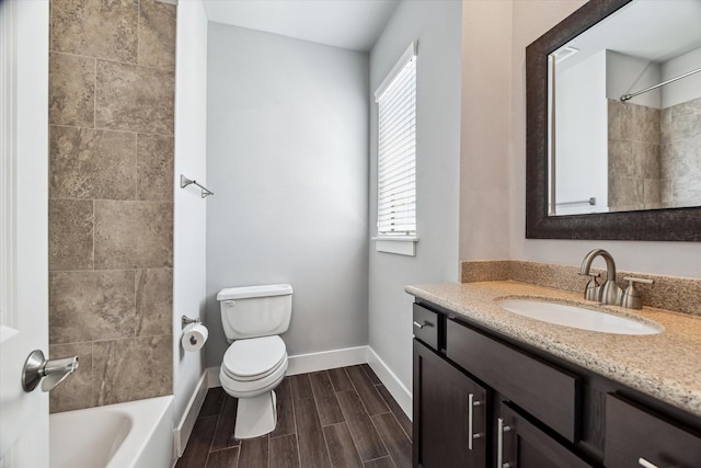 783 Waverly St, Houston, TX 77007 - bathroom with toilet, baseboards, vanity, wood finished floors, and shower / bathtub combination