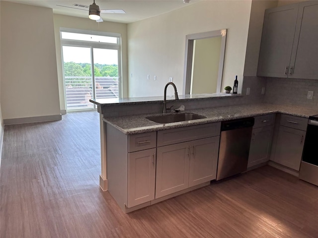 6955 Turtlewood Dr Unit 502, Houston, TX 77072 - kitchen featuring a sink, appliances with stainless steel finishes, light wood-style floors, and ceiling fan