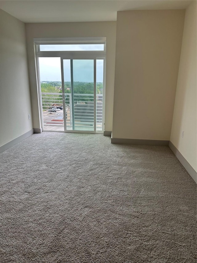 6955 Turtlewood Dr Unit 502, Houston, TX 77072 - carpeted spare room featuring baseboards