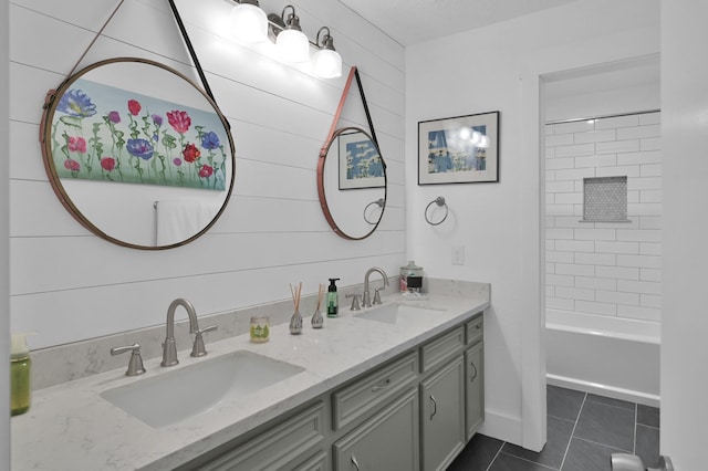 914 Rustic Oaks Dr, Magnolia, TX 77354 - full bathroom with tile patterned floors, double vanity, and bathtub / shower combination