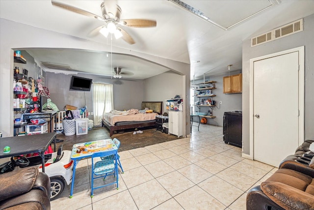 2106 Antoine Dr, Houston, TX 77055 - bedroom featuring light tile patterned flooring, attic access, and a ceiling fan
