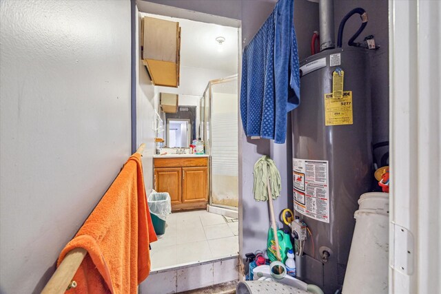 2106 Antoine Dr, Houston, TX 77055 - full bath with gas water heater, a stall shower, and vanity