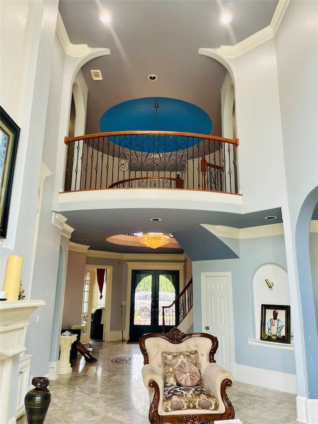 8930 Water Crest Trl, Richmond, TX 77469 - foyer featuring a high ceiling, marble tiled flooring, french doors, recessed lighting, and arched walkways
