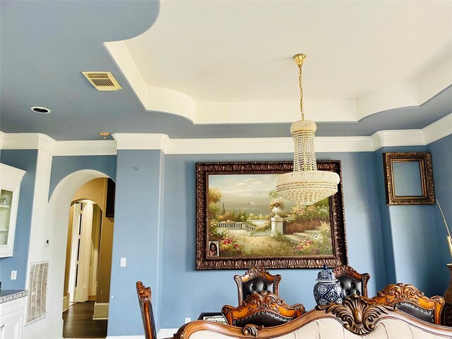 8930 Water Crest Trl, Richmond, TX 77469 - dining space with a raised ceiling, arched walkways, and ornamental molding