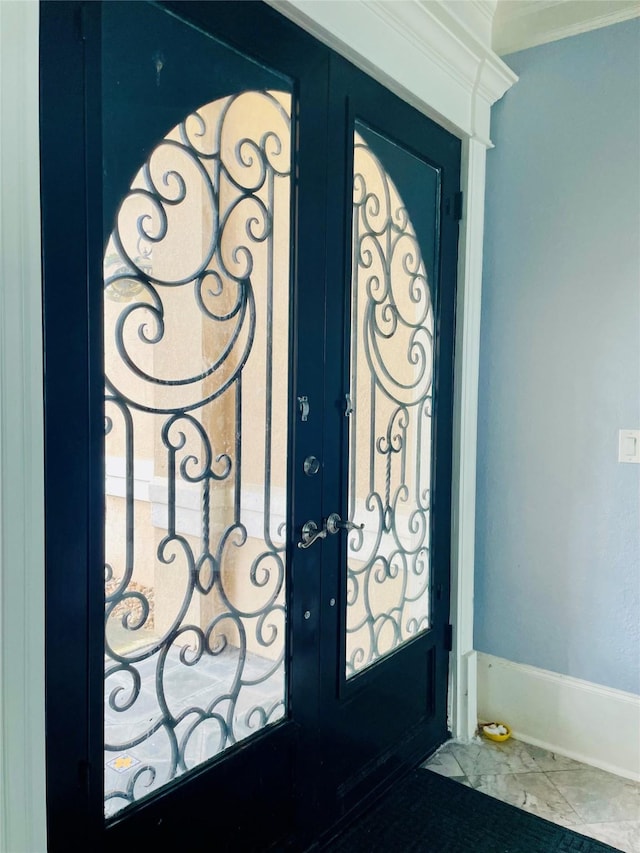 8930 Water Crest Trl, Richmond, TX 77469 - entryway with french doors, ornamental molding, and marble finish floors