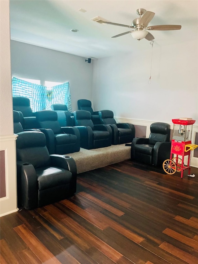 8930 Water Crest Trl, Richmond, TX 77469 - home theater with wood finished floors, ceiling fan, and wainscoting
