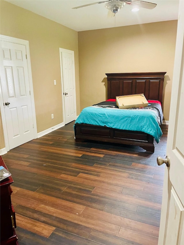 8930 Water Crest Trl, Richmond, TX 77469 - bedroom with hardwood / wood-style flooring, ceiling fan, and baseboards