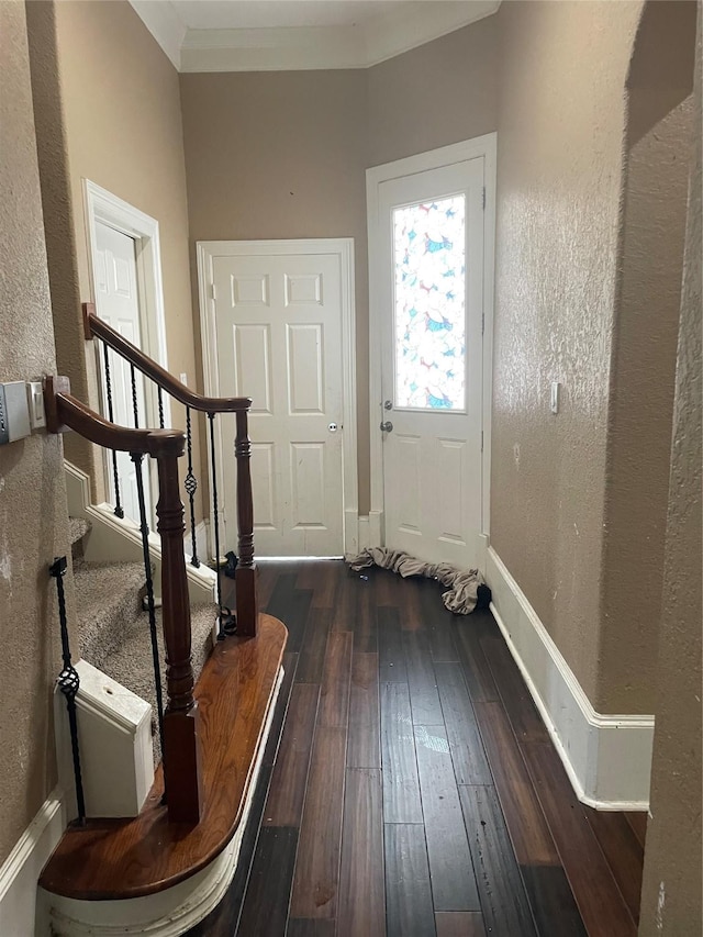 8930 Water Crest Trl, Richmond, TX 77469 - entrance foyer featuring hardwood / wood-style flooring, a textured wall, stairs, and baseboards