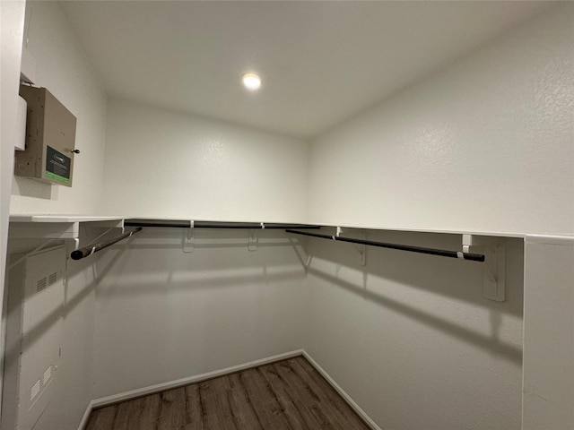 spacious closet with wood finished floors