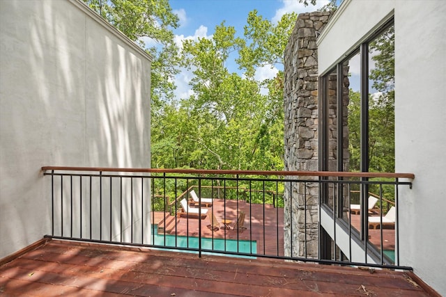 view of wooden balcony featuring a deck