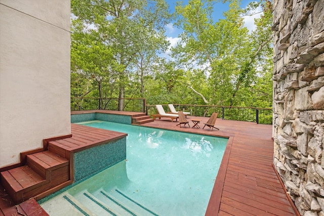 swimming pool featuring a wooden deck