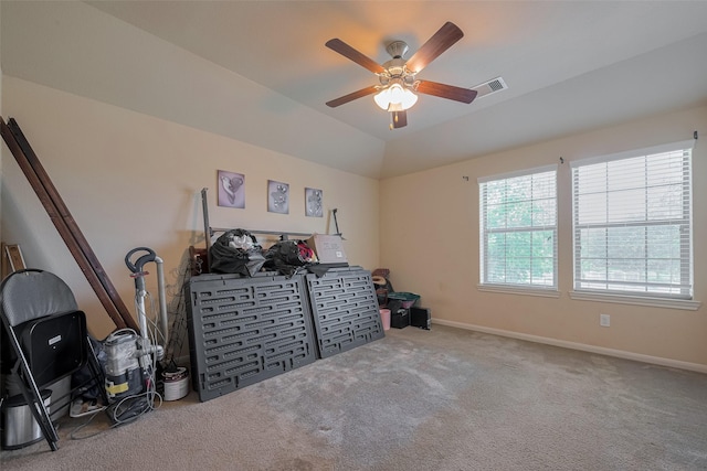 bedroom featuring carpet floors, baseboards, a ceiling fan, and vaulted ceiling
