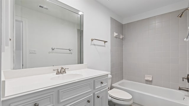 full bathroom featuring toilet, bathtub / shower combination, and vanity