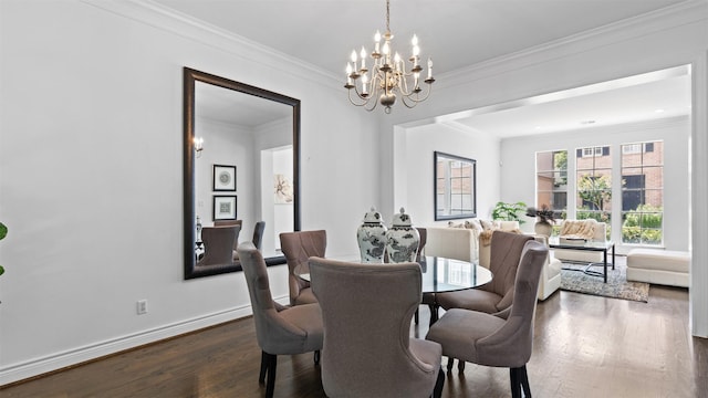 dining area with a chandelier, dark wood-style flooring, ornamental molding, and baseboards