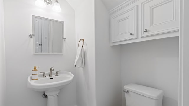 bathroom featuring toilet