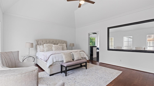 bedroom with multiple windows, wood-type flooring, ornamental molding, baseboards, and a ceiling fan