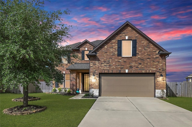 8207 Oxbow Manor Ln, Cypress, TX 77433 - traditional-style house with brick siding, an attached garage, and driveway
