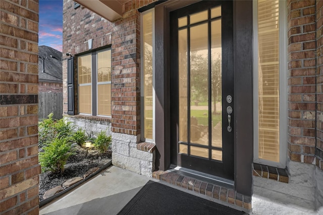 8207 Oxbow Manor Ln, Cypress, TX 77433 - doorway to property featuring brick siding and fence