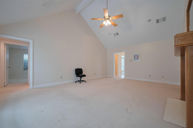 unfurnished living room with high vaulted ceiling, beam ceiling, light carpet, ceiling fan, and baseboards