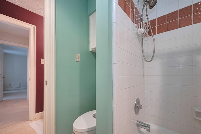 full bathroom with shower / tub combination and toilet