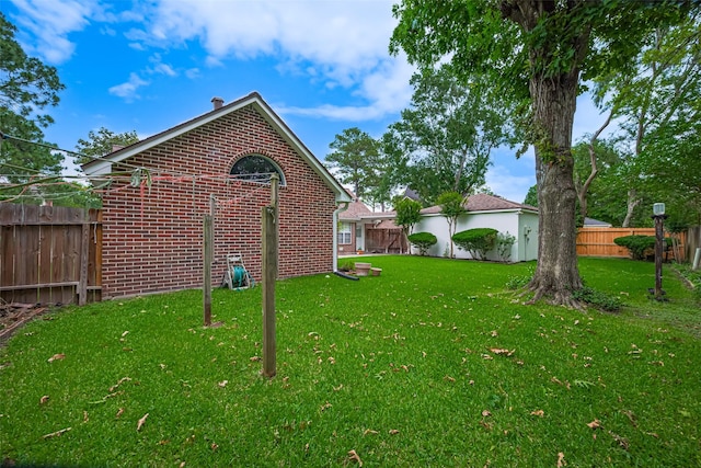 view of side of property with brick siding