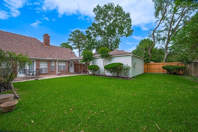 view of yard with a patio area
