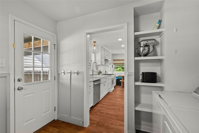 entryway featuring separate washer and dryer and dark wood-style floors