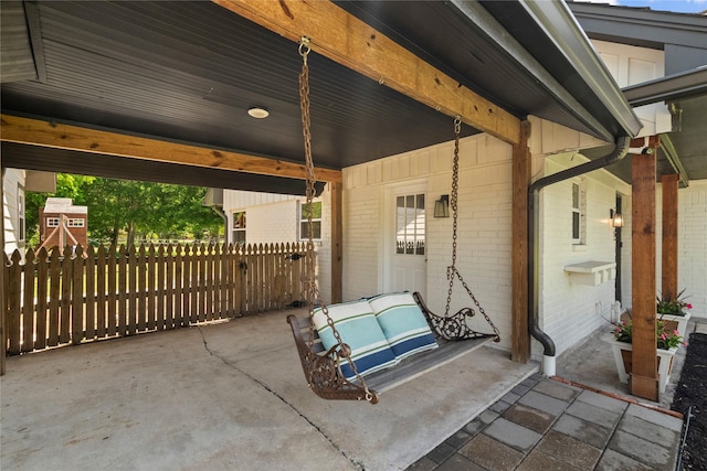 view of patio / terrace with fence