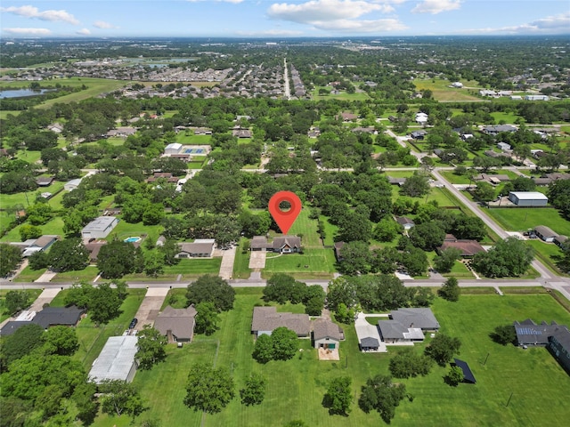 aerial view of property's location featuring nearby suburban area