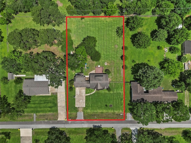 aerial view of property and surrounding area with property boundaries highlighted